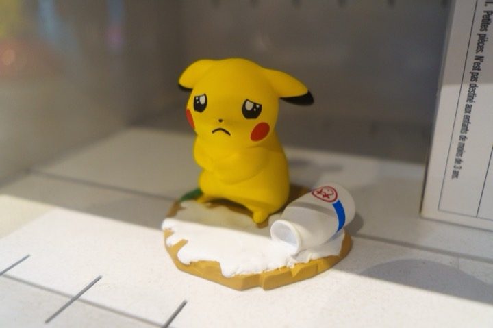 A Pikachu figure on a museum display