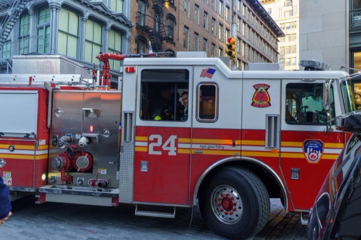 An FDNY fire engine parked on a city street