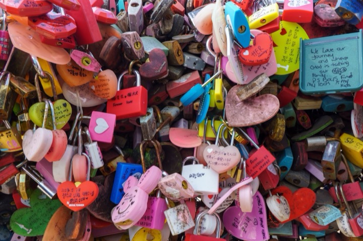 Colorful love locks piled together