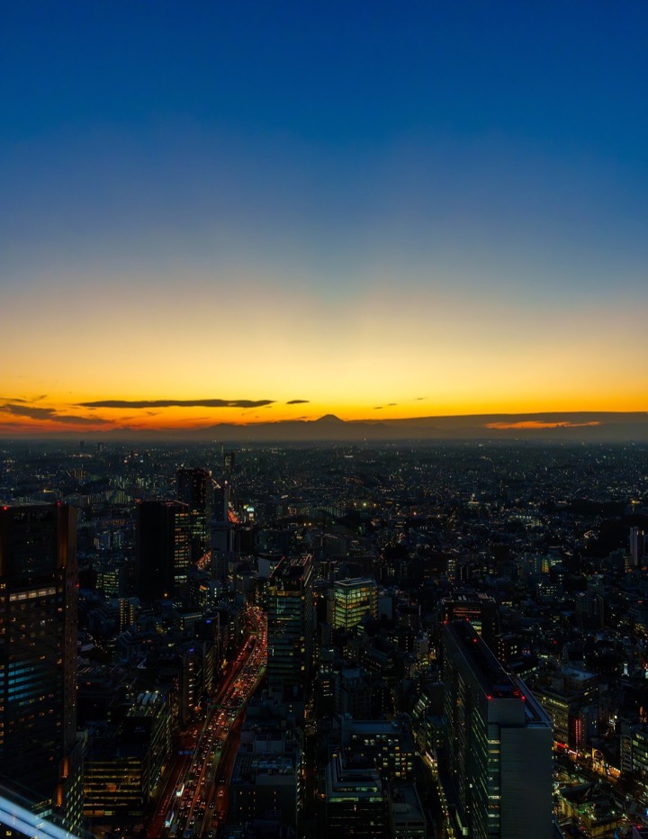 Sunset over Tokyo from Shibuya, with Mount Fuji on the horizon