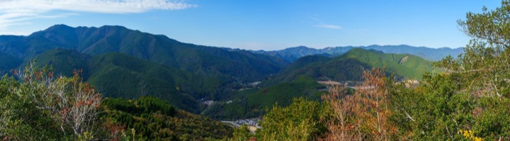 Forested mountains rolling into the distance on the Kumano Kodo